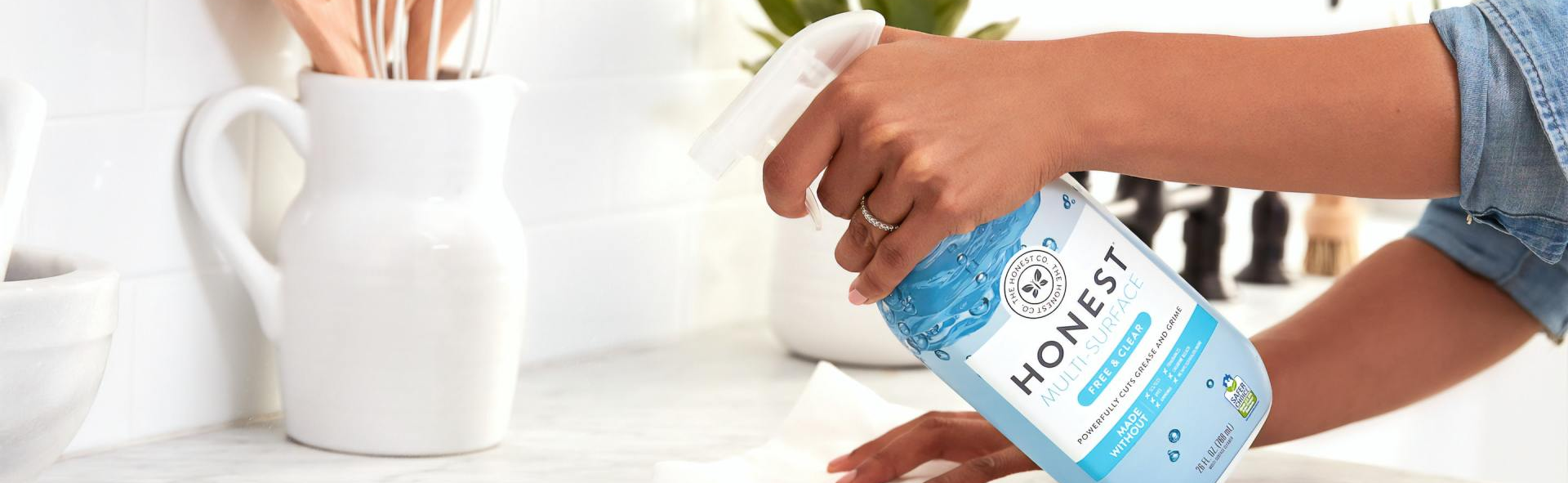 Woman Cleaning Kitchen