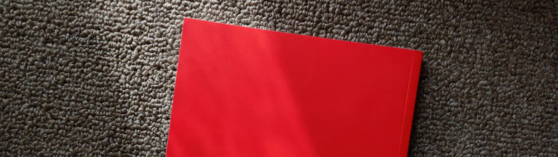 Red Folder on Carpet