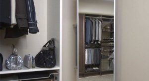 Slide-out mirror in closet