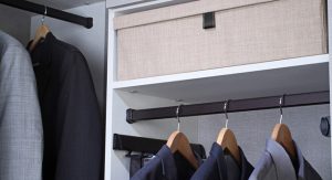 Storage box on high shelf in closet