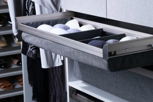 Socks inside divided drawer in closet