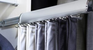 Neckties on a rack in a closet